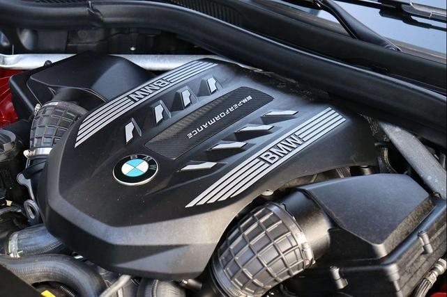 Photo of 2021 Flamenco Red Metallic BMW X6