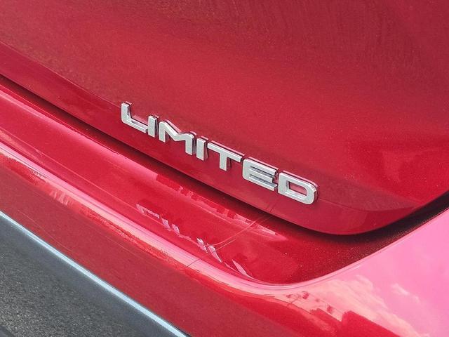 Photo of 2022 Ruby Flare Pearl Toyota Highlander Hybrid