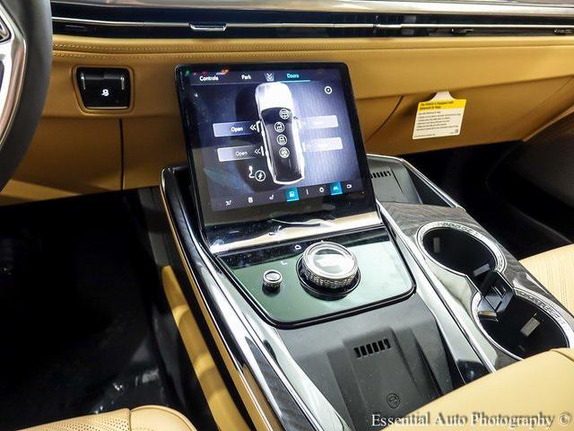 Photo of 2025 Black Raven Cadillac Escalade IQ