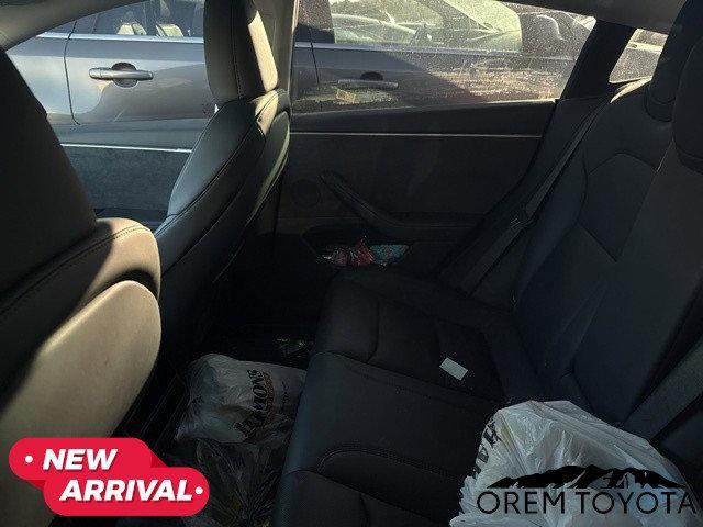 Photo of 2025 Ultra Red Tesla Model 3