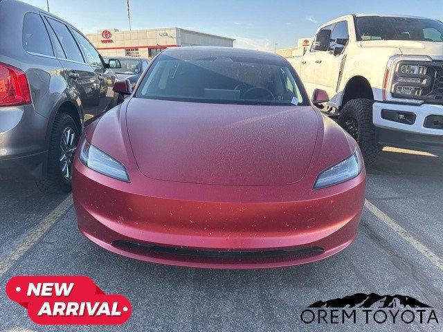 Photo of 2025 Ultra Red Tesla Model 3