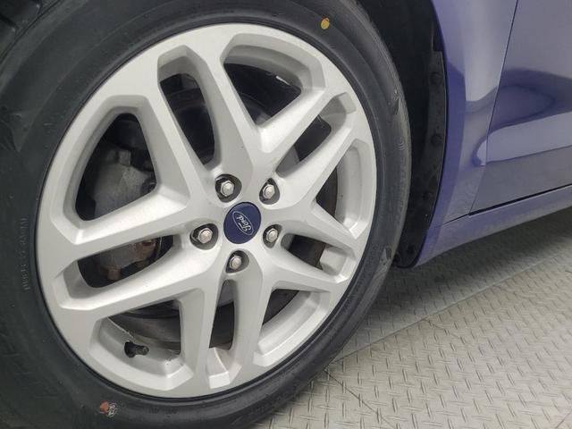 Photo of 2015 Deep Impact Blue Ford Fusion