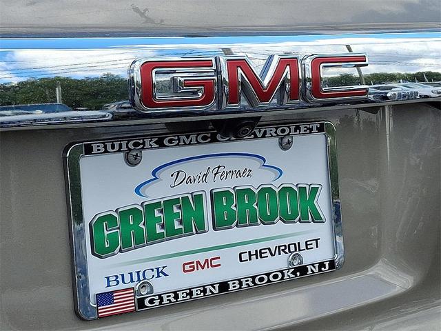 Photo of 2023 Light Stone Metallic GMC Acadia