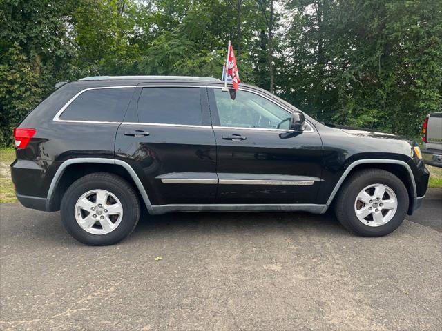 Photo of 2012 Brilliant Black Crystal Pearlcoat Jeep Grand Cherokee