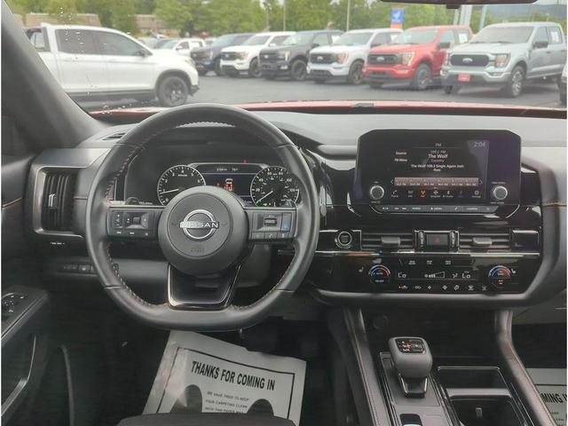 Photo of 2024 Scarlet Ember Tintcoat/Super Black Nissan Pathfinder