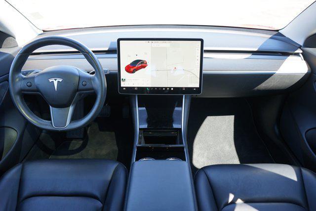 Photo of 2018 Red Multi-Coat Tesla Model 3
