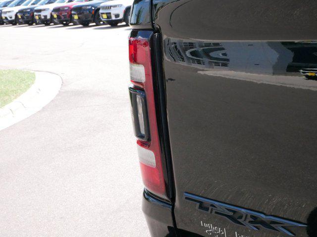 Photo of 2022 Diamond Black Crystal Pearlcoat RAM 1500