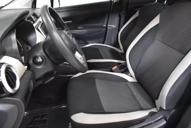 Photo of 2022 Aspen White Tricoat Nissan Versa