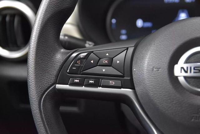 Photo of 2022 Aspen White Tricoat Nissan Versa