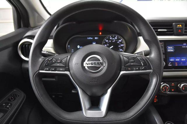 Photo of 2022 Aspen White Tricoat Nissan Versa