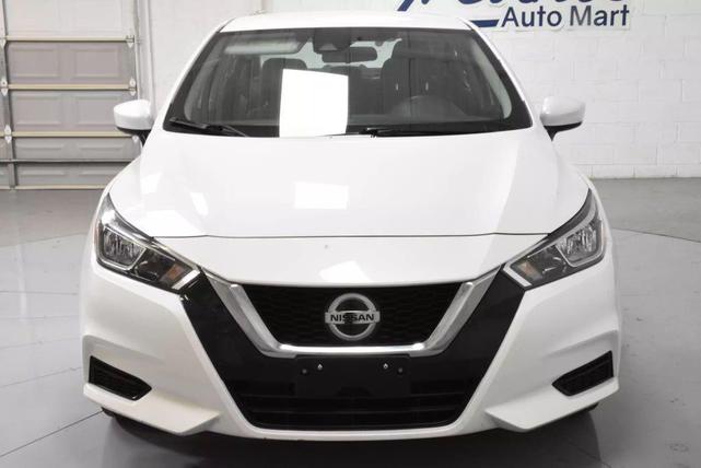 Photo of 2022 Aspen White Tricoat Nissan Versa