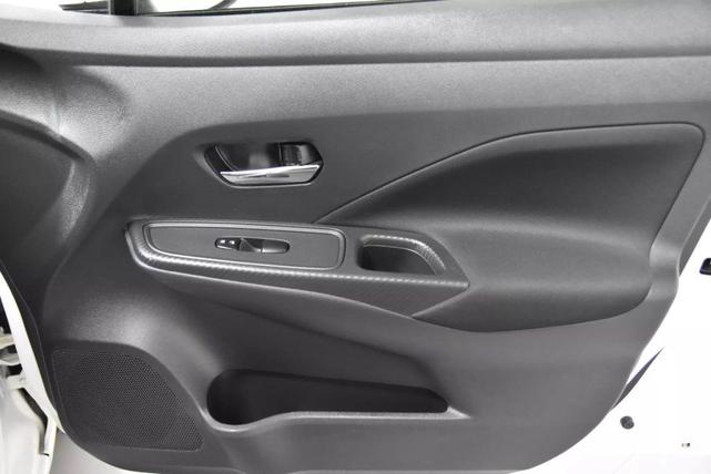 Photo of 2022 Aspen White Tricoat Nissan Versa