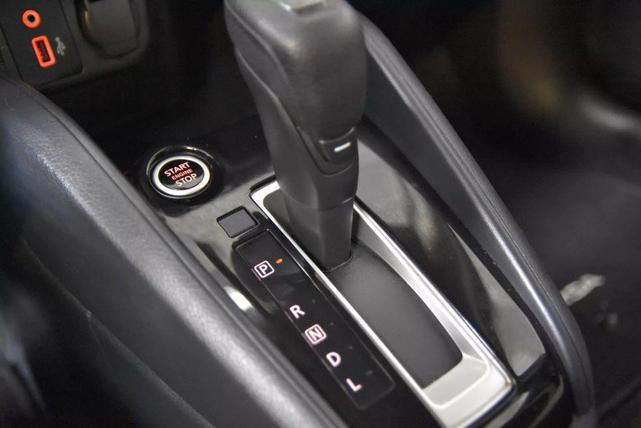 Photo of 2022 Aspen White Tricoat Nissan Versa