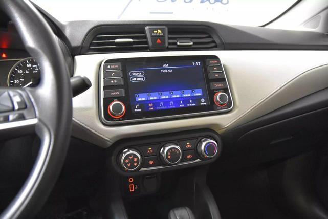 Photo of 2022 Aspen White Tricoat Nissan Versa