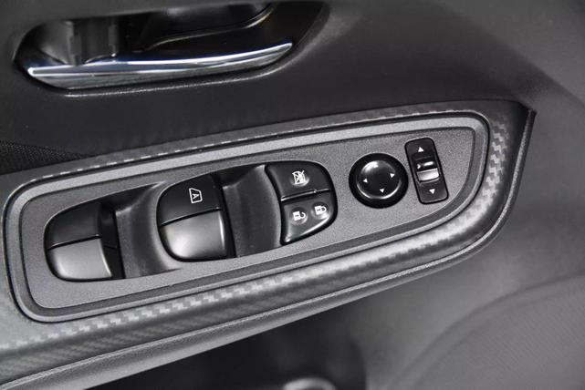 Photo of 2022 Aspen White Tricoat Nissan Versa