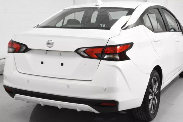 Photo of 2022 Aspen White Tricoat Nissan Versa