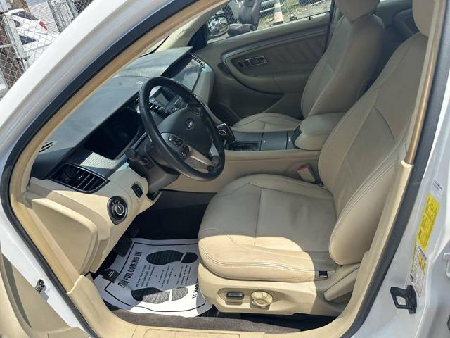 Photo of 2015 White Ford Taurus