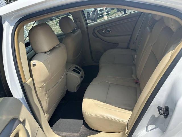 Photo of 2015 White Ford Taurus