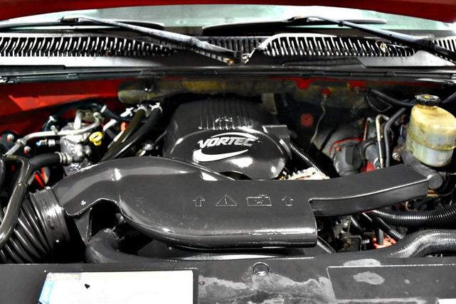 Photo of 2001 Red Chevrolet Suburban