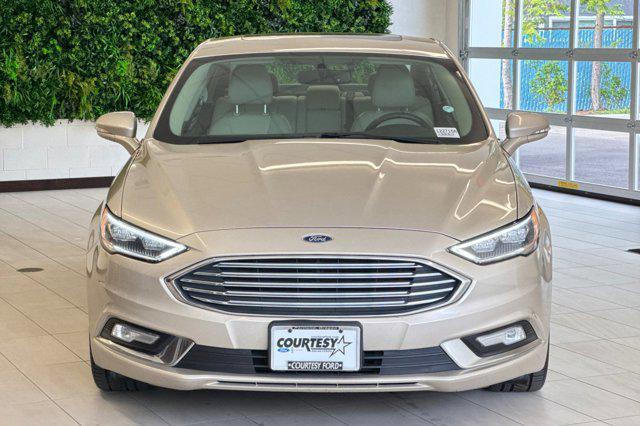 Photo of 2017 White Gold Ford Fusion Hybrid