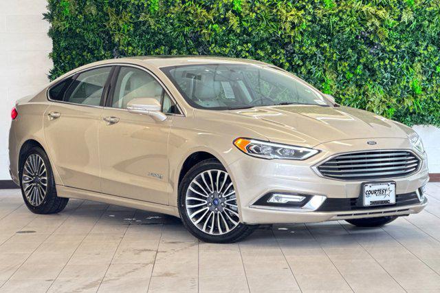 Photo of 2017 White Gold Ford Fusion Hybrid