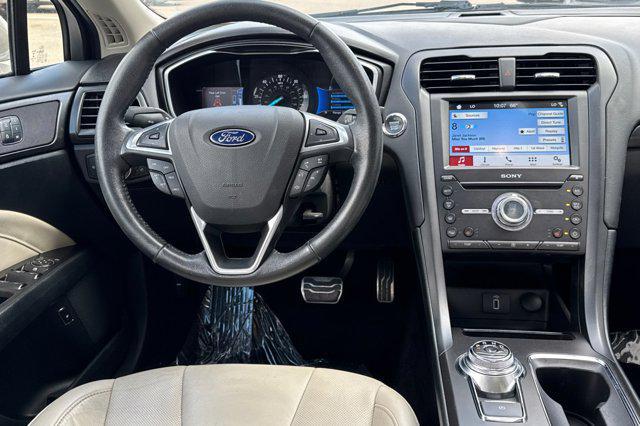 Photo of 2017 White Gold Ford Fusion Hybrid