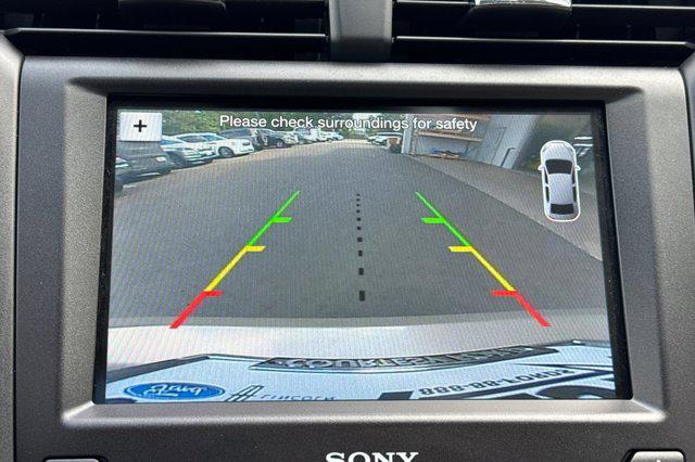 Photo of 2017 White Gold Ford Fusion Hybrid