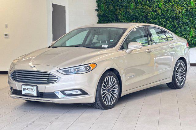 Photo of 2017 White Gold Ford Fusion Hybrid