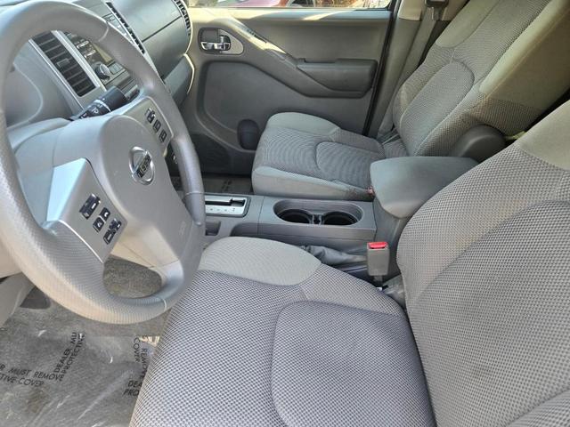 Photo of 2013 Brilliant Silver Nissan Frontier