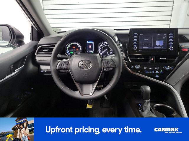 Photo of 2023 White Toyota Camry Hybrid