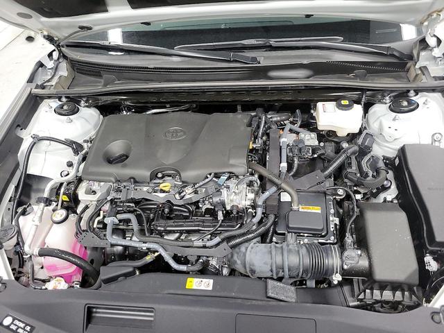 Photo of 2023 White Toyota Camry Hybrid