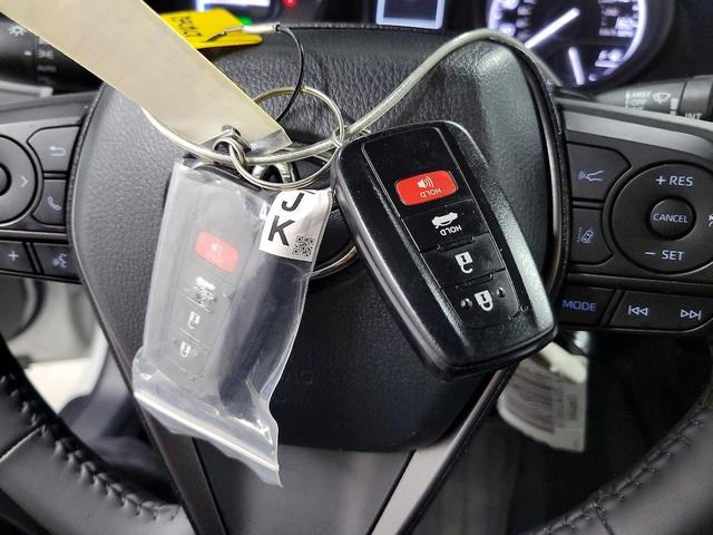 Photo of 2023 White Toyota Camry Hybrid