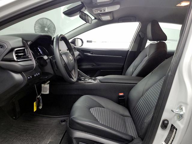 Photo of 2023 White Toyota Camry Hybrid