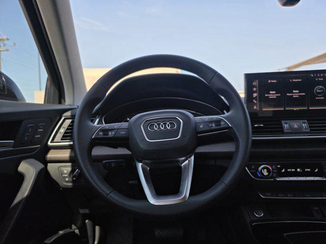 Photo of 2024 Mythos Black Metallic Audi Q5