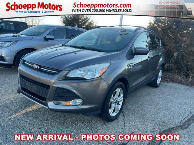 Photo of 2014 Ingot Silver Metallic Ford Escape