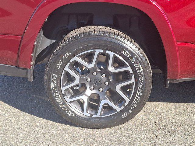 Photo of 2025 Delmonico Red Pearlcoat RAM 1500