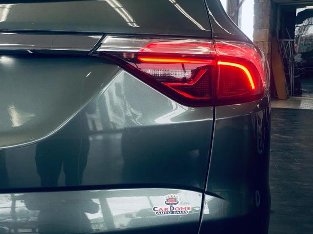 Photo of 2023 Sage Metallic Buick Enclave