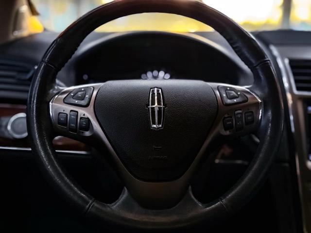 Photo of 2015 Tuxedo Black Metallic Lincoln MKX