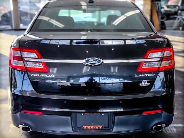 Photo of 2014 Tuxedo Black Metallic Ford Taurus