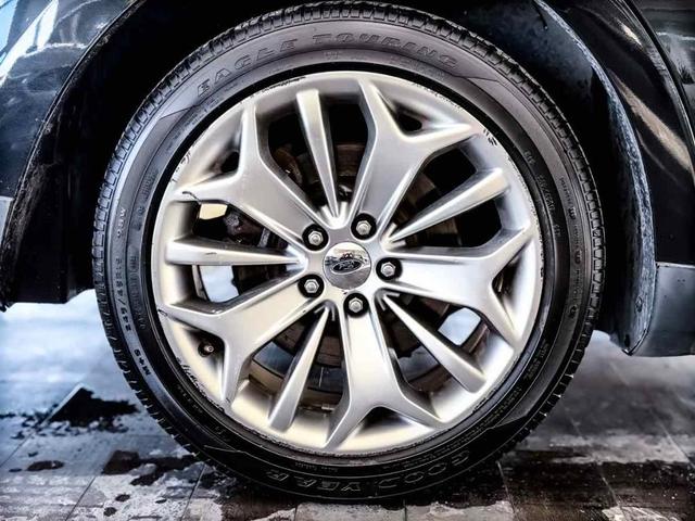 Photo of 2014 Tuxedo Black Metallic Ford Taurus