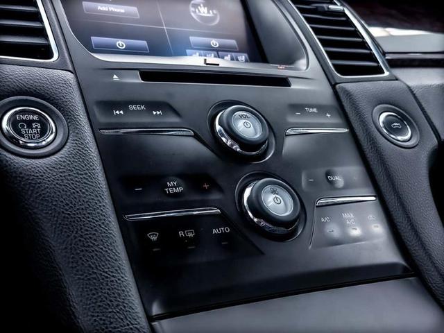 Photo of 2014 Tuxedo Black Metallic Ford Taurus