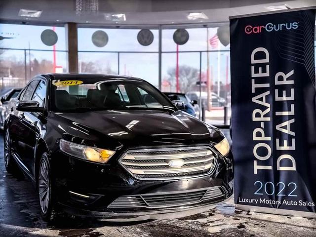 Photo of 2014 Tuxedo Black Metallic Ford Taurus