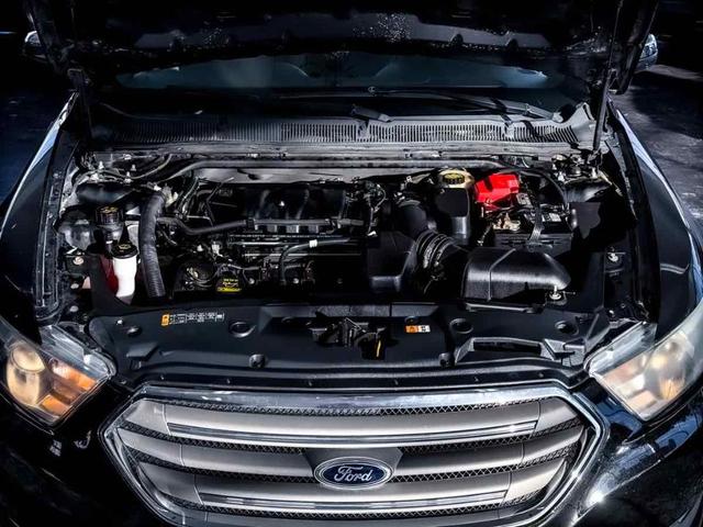 Photo of 2014 Tuxedo Black Metallic Ford Taurus