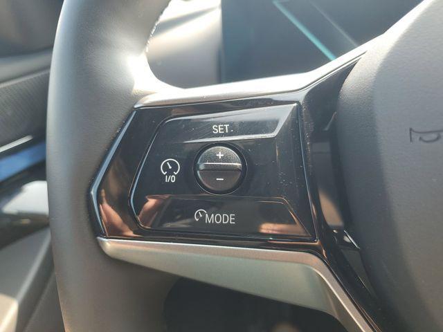 Photo of 2024 Black Sapphire Metallic BMW i5