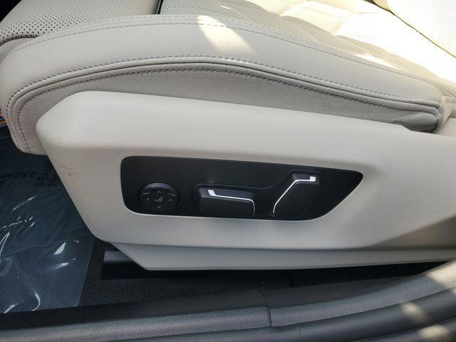 Photo of 2024 Black Sapphire Metallic BMW i5
