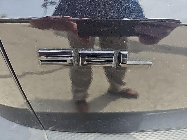 Photo of 2022 Agate Black Metallic Ford Escape