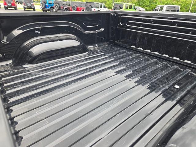 Photo of 2023 Diamond Black Crystal Pearlcoat RAM 1500 Classic