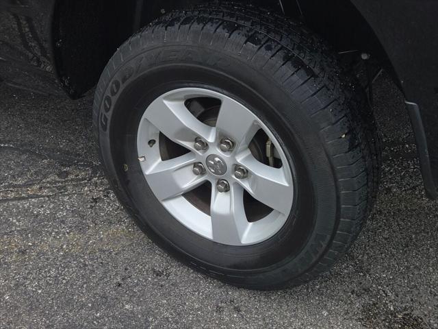 Photo of 2023 Diamond Black Crystal Pearlcoat RAM 1500 Classic