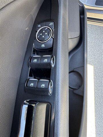 Photo of 2014 Sterling Gray Metallic Ford Fusion Hybrid