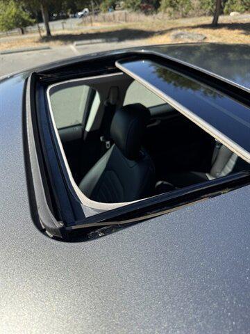 Photo of 2014 Sterling Gray Metallic Ford Fusion Hybrid